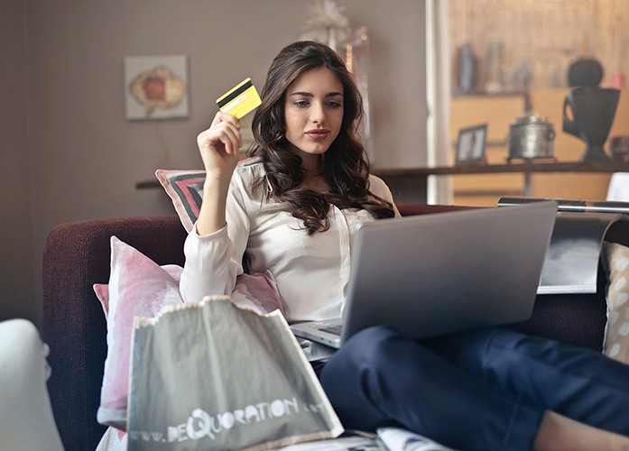 Woman purchasing on laptop